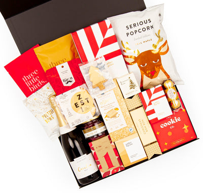 The Christmas Cheer - End of Year Holiday Gift with champagne, chocolate, popcorn, pretzels, pies, cookies and relish