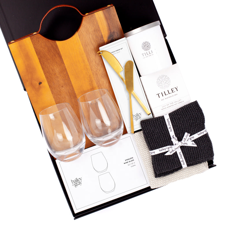 The Little Luxuries - Kitchenwares Gift Hamper - Serving Board, glasses, cheese knife set, candle and cloths