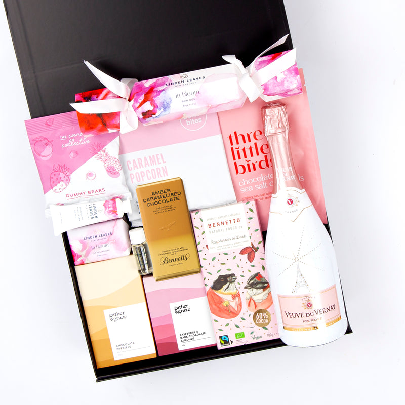 The Pink Perfection Gift Hamper - Chocolate, Popcorn, Caramels, Almonds, Hand Cream & Wine